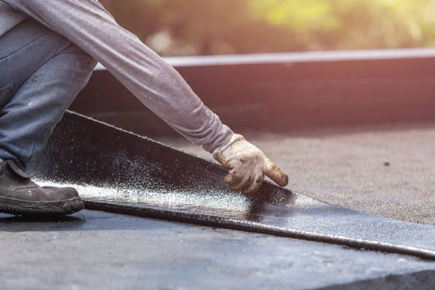Professional Basement Waterproofing technician working in Bon Aqua, TN